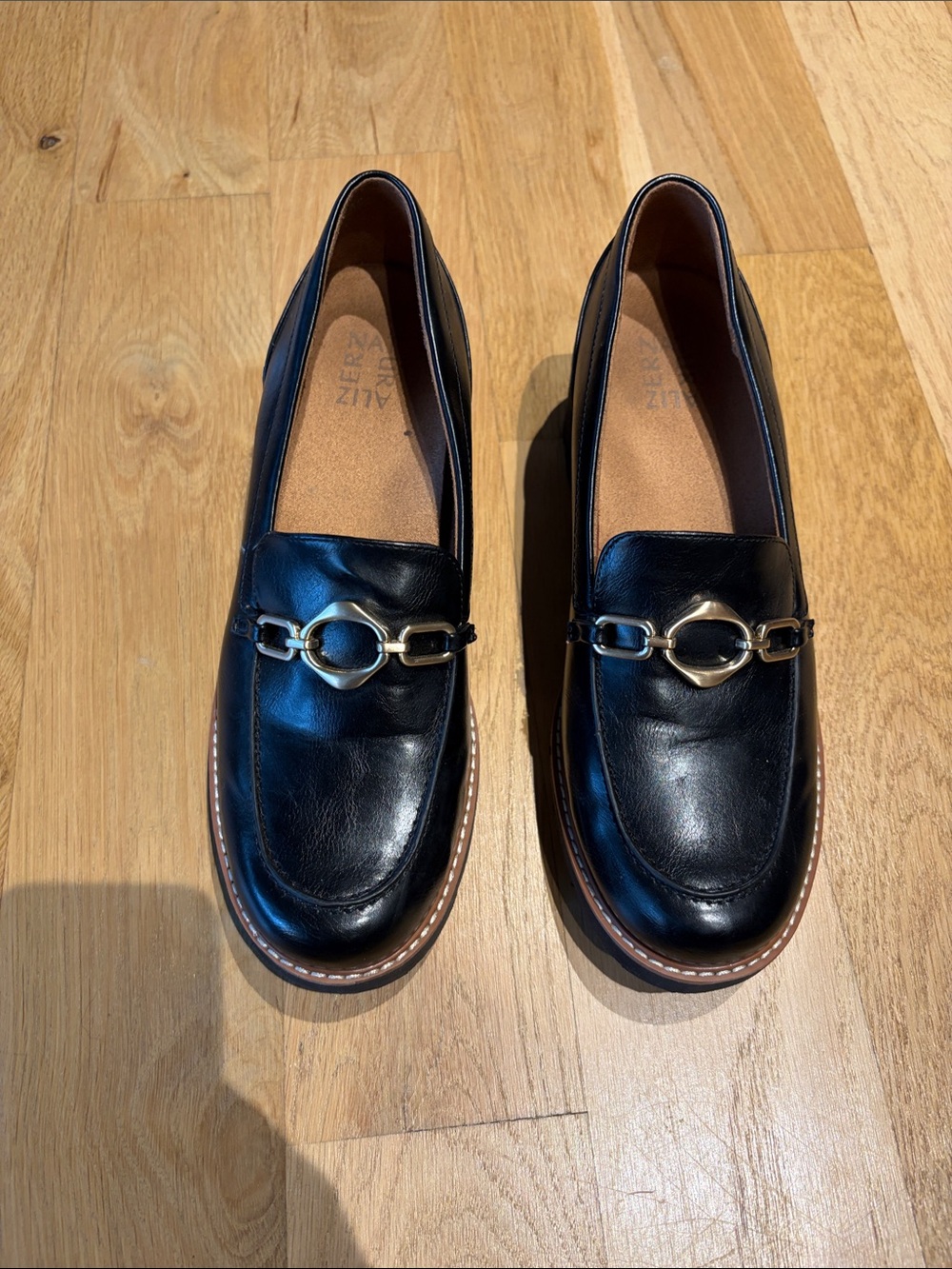 Black Leather Slip-On Loafers with Gold Chain Accent - Women